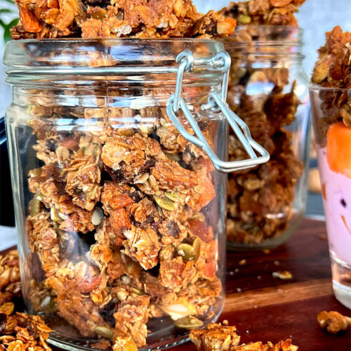 Crunchy homemade granola clusters with golden color, packed with nuts and fruits,gluten-free and perfect for breakfast, & post-workout snack