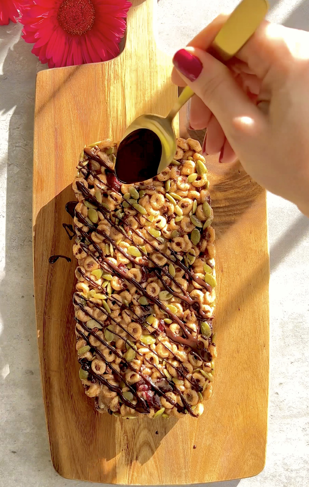 drizzle melted chocolate over the block of Easy Healthy Homemade cereal bars- Paleo, Refined Sugar Free, gluten free 