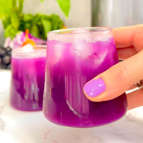 Detox juice made with red cabbage, cucumber, black grapes, mint, and pear – supports weight loss, hydration, gut health, and inflammation reduction
