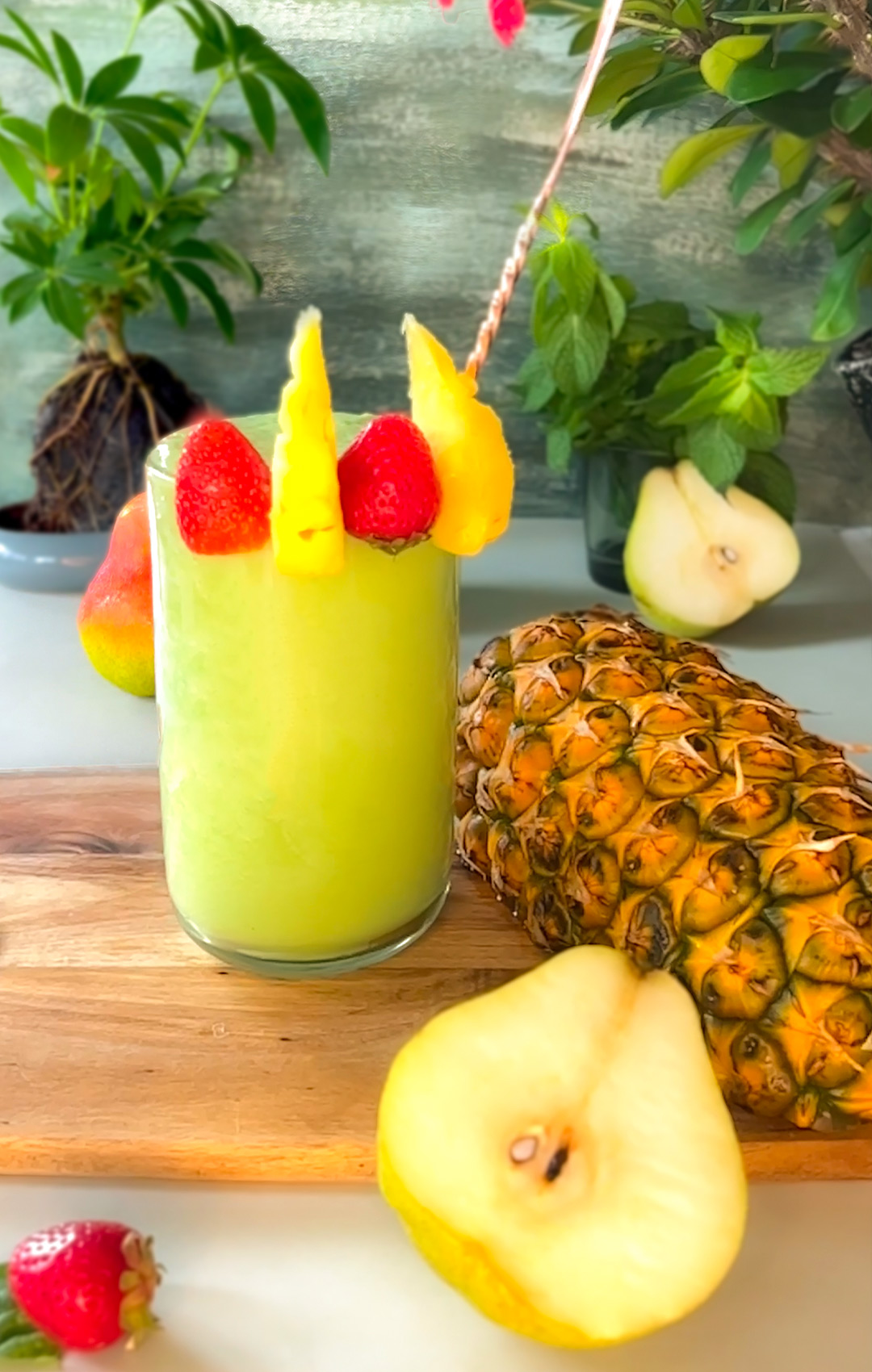 Tropical Immune-Boosting Smoothie combination of pineapple, pear, strawberry, spinach, and mint. these ingredients Increases Metabolism and Supports Weight Loss