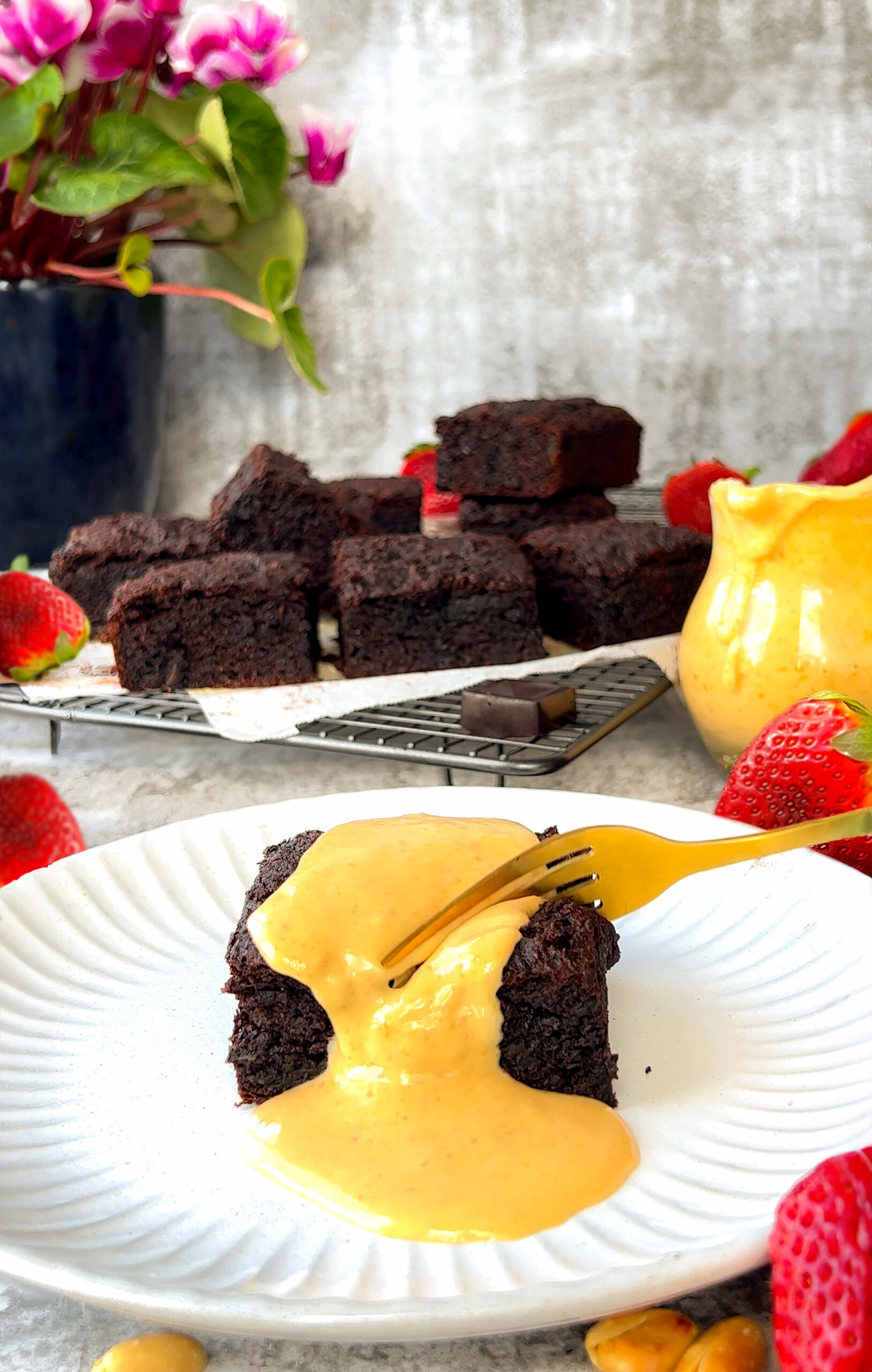 Soft, moist rich and fudgy texture of a gluten-free, Refined Sugar-Free brownie cake- made with almond flour, dates