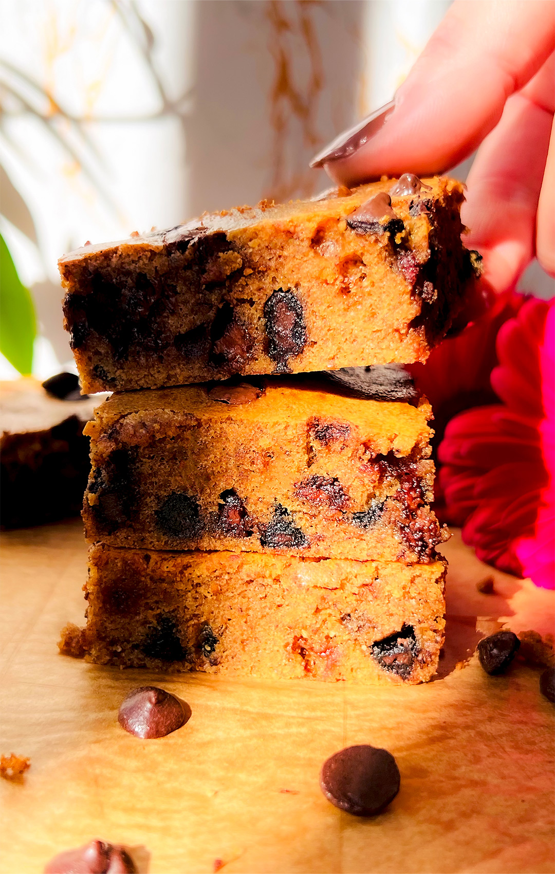 Almond butter blondies stacked on a plate showing perfect blend of gooey, chewy, and rich texture with a slightly crispy edge-Gluten-free, paleo & keto