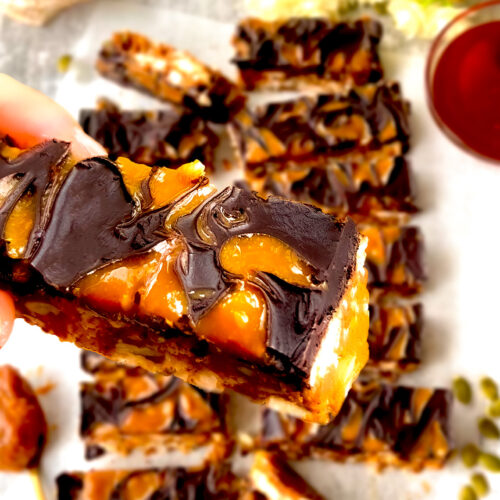 Close-up of No-Bake Rice Cake Crunch Bars featuring a rich swirl of chocolate and peanut butter with a gorgeous 3D effect on top- quick & easy to make at home