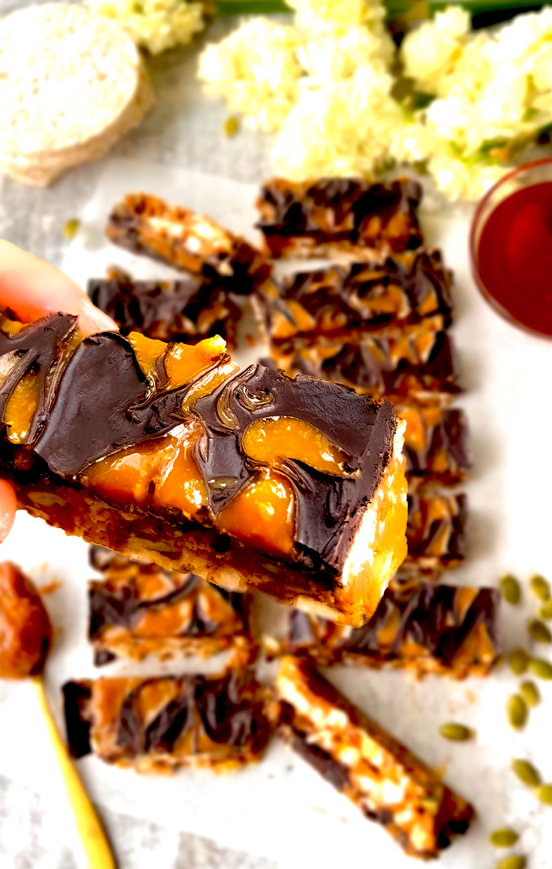 Close-up of No-Bake Rice Cake Crunch Bars featuring a rich swirl of chocolate and peanut butter with a gorgeous 3D effect on top- quick & easy to make at home