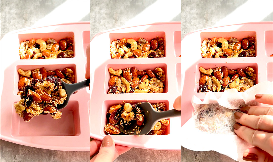 Three-step collage showing how to press warm nut and seed mixture into silicone bar moulds using a spatula and baking paper with fingers. Compacting for firm texture. No-bake, paleo, and clean-eating friendly snack.