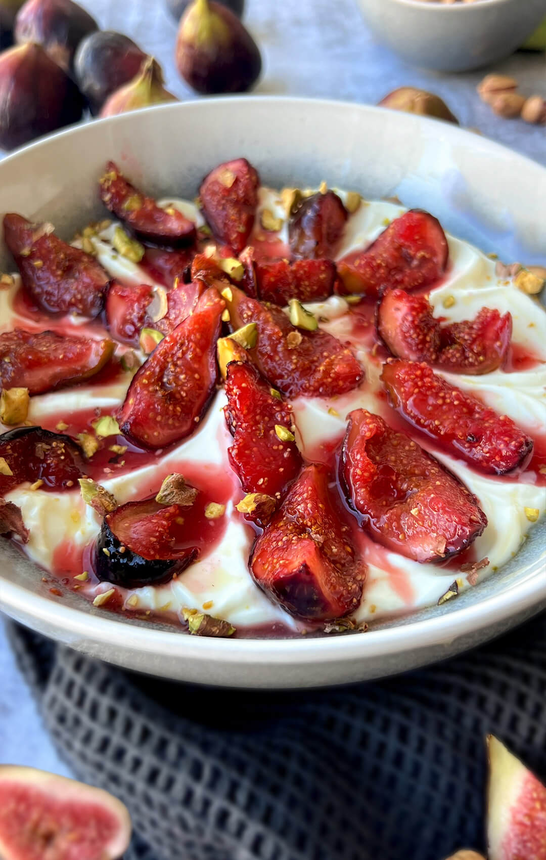 Honey Roasted Figs Yogurt Bowl, a healthy and naturally sweetened, Rich in Fiber and Packed with Antioxidants. Juicy figs are gently caramelised with honey, cinnamon, and lemon, served over creamy yogurt bowl with a touch of zest and crunchy pistachios. Its perfect as a healthy dessert or snack , more over its paleo, vegan and keto option, perfect for after workout.
