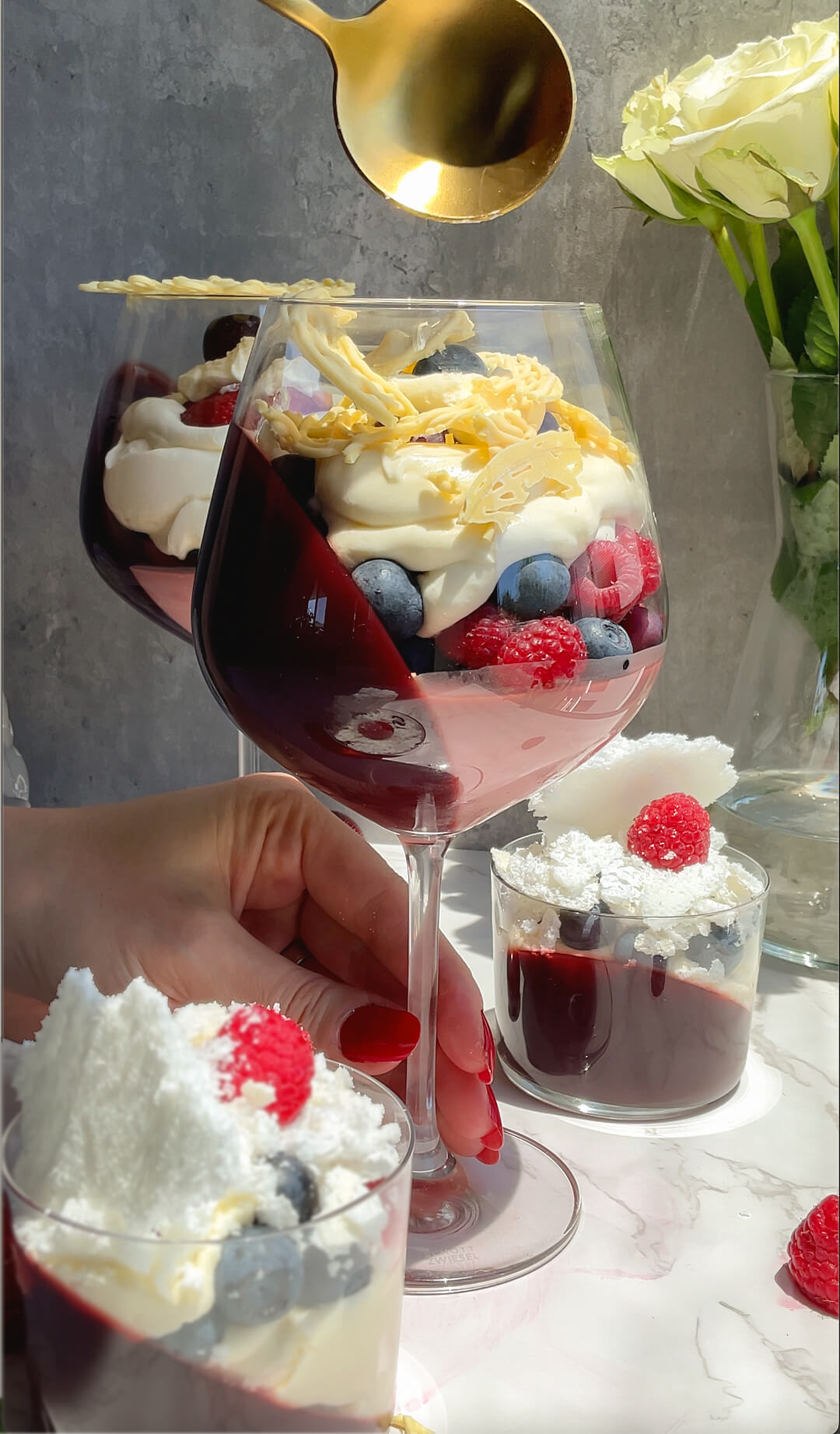A spoon gently cracks the white chocolate lace topping, revealing layers of creamy flummery, fresh berries, and pomegranate jelly. This healthy trifle is light, refreshing, and made with real ingredients, no refined sugar, and gluten free, Low carb, keto, gluten free and sugar free.