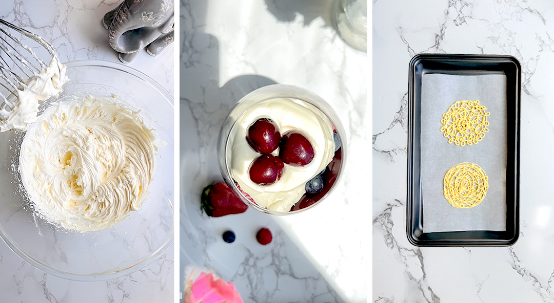 Cream and sweetener being whipped with an electric mixer in a bowl, then piped over the berries, with white chocolate lace circles prepared for the crack topping on the trifle. Gluten free, no refined sugar, holiday. The final layers add lightness and elegance, making the trifle perfect for holidays, celebrations, and make-ahead desserts.