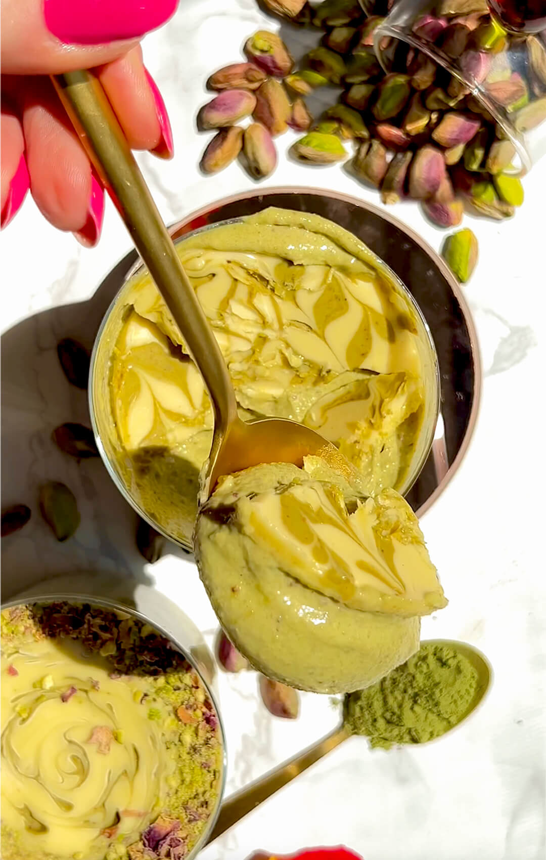 Close-up of thick, creamy pistachio cottage cheese pudding showing a smooth, velvety texture. Made with roasted pistachios, cottage cheese, matcha, and dates, this refined sugar-free, high protein dessert is quick and easy to make by blending and chilling.