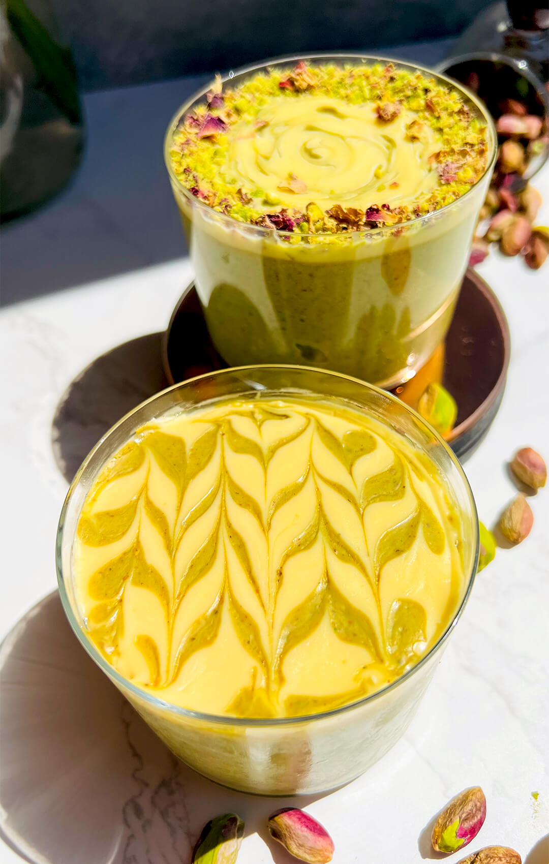 High protein pistachio cottage cheese pudding with creamy texture and swirl topping.smooth, creamy texture and decorative swirl topping. Made with cottage cheese, pistachios, dates, and matcha, this quick and easy dessert is blended, decorated, and chilled for a nourishing finish.