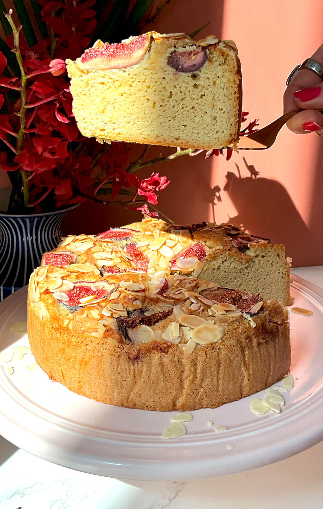 Close-up of a sliced Fig Almond Olive Oil Cake showing the soft, moist and tender almond flour crumb with fresh figs baked into the top. This healthy sugar-free, gluten-free and dairy-free cake is made with simple wholesome ingredients and feels rich without being heavy.