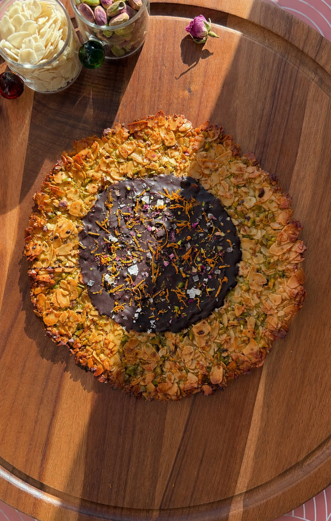 28 almond pistachio florentine cookie pizza with dark chocolate centre.jpg