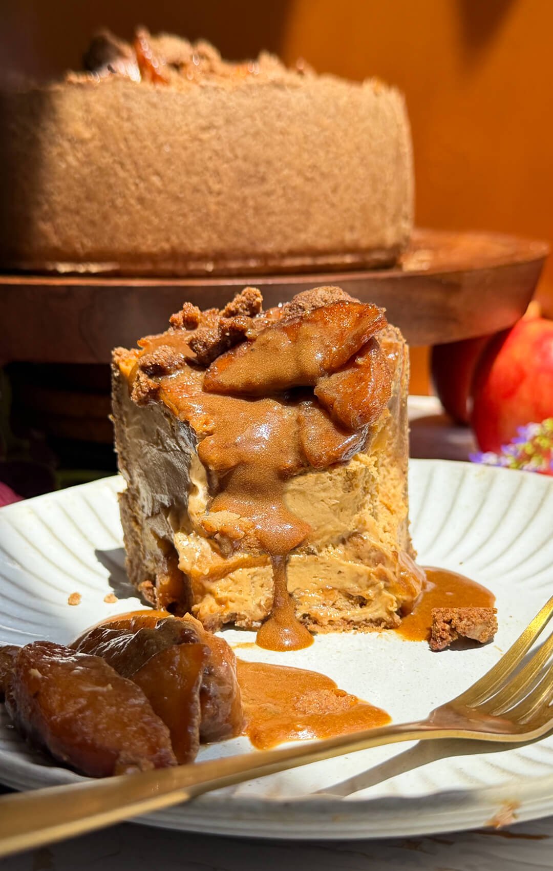 apple pie cheesecake slice spiced apples caramel